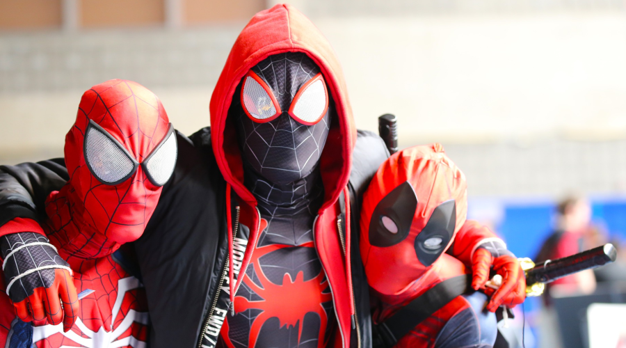 people dressed up like comic book characters