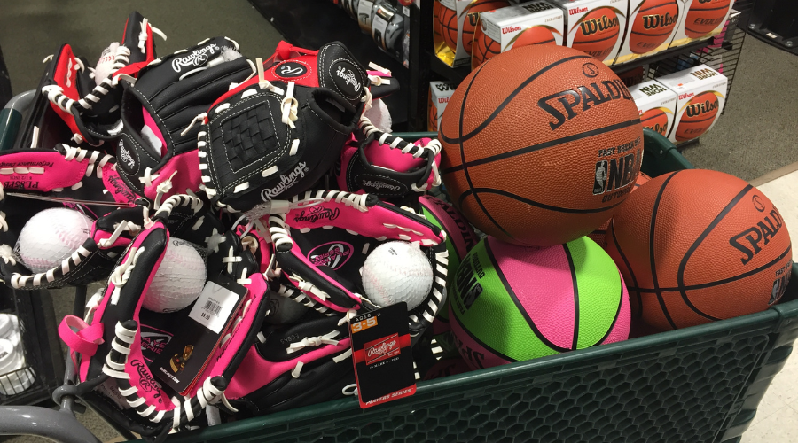 shopping cart of sports equipment for Cops for Tots