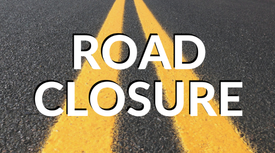 Road with text saying road closure